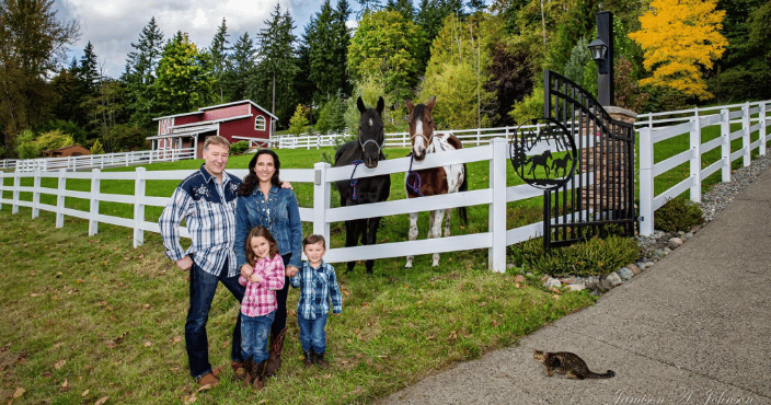 A Family with their horses and cat on their ranch!